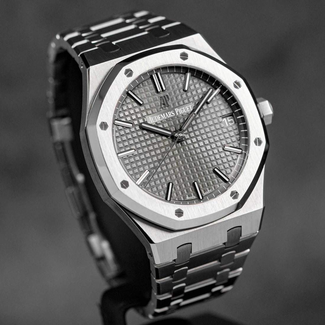 Audemars Piguet Royal Oak watch, specifically a 41mm model with a grey dial.