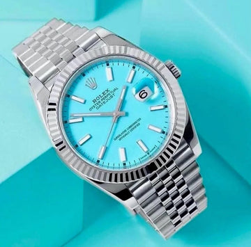 Datejust 41 with a custom turquoise "Tiffany" index dial, a white gold fluted bezel, and a stainless steel Jubilee bracelet.